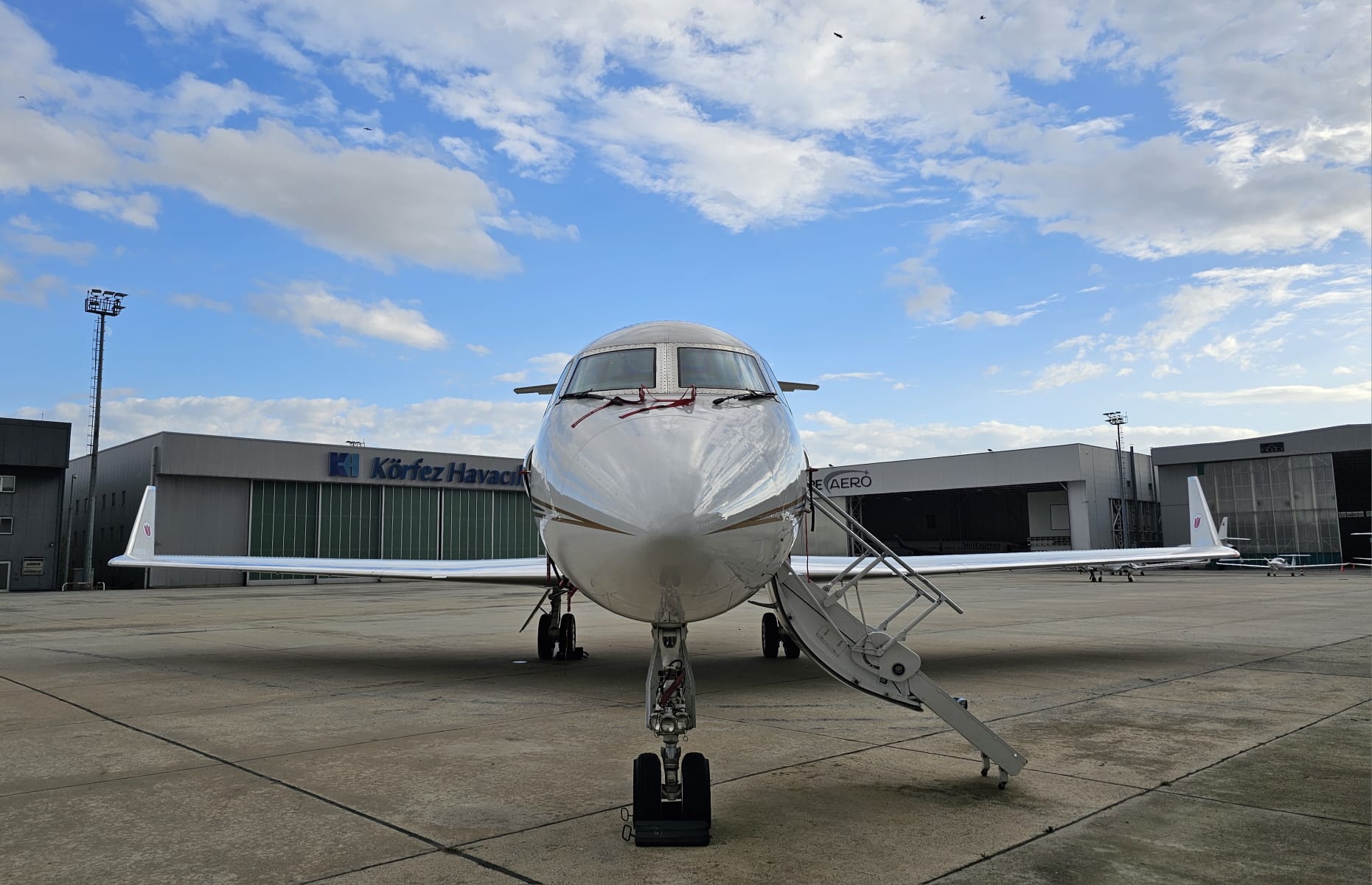TC-IHY Gulfstream nose-on view on the apron with airstairs deployed